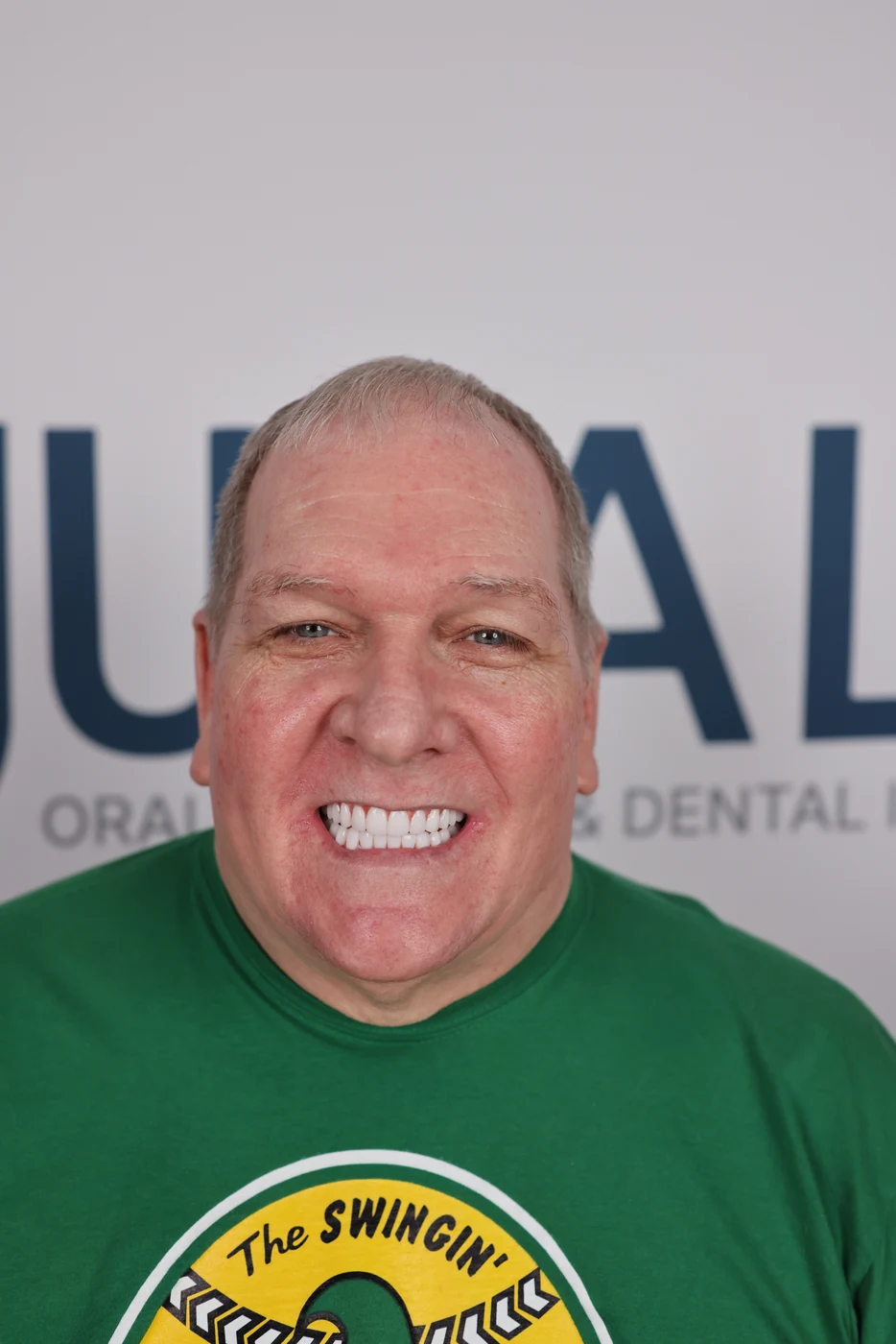 Patient smile after full-arch dental implant treatment, patient case 03